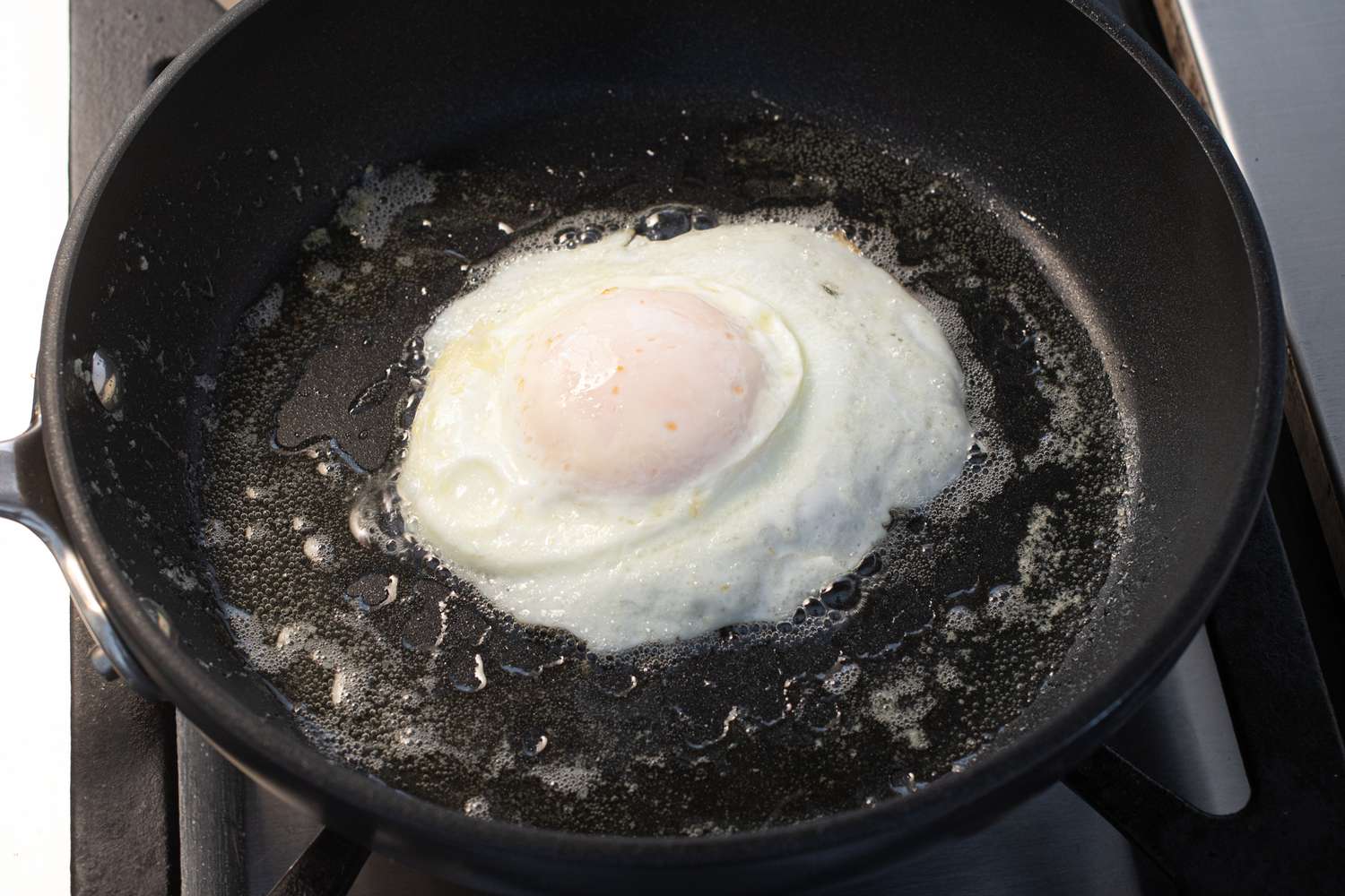 Egg cooked over easy in the skillet