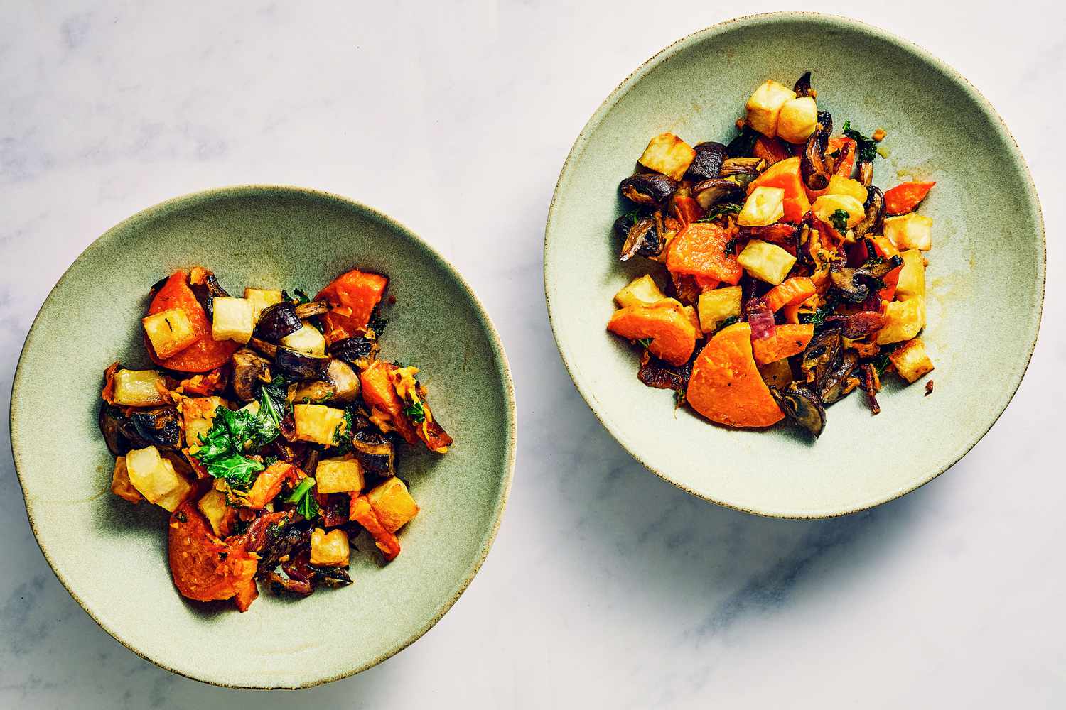 Two large bowls of the breakfast potato-mushroom hash