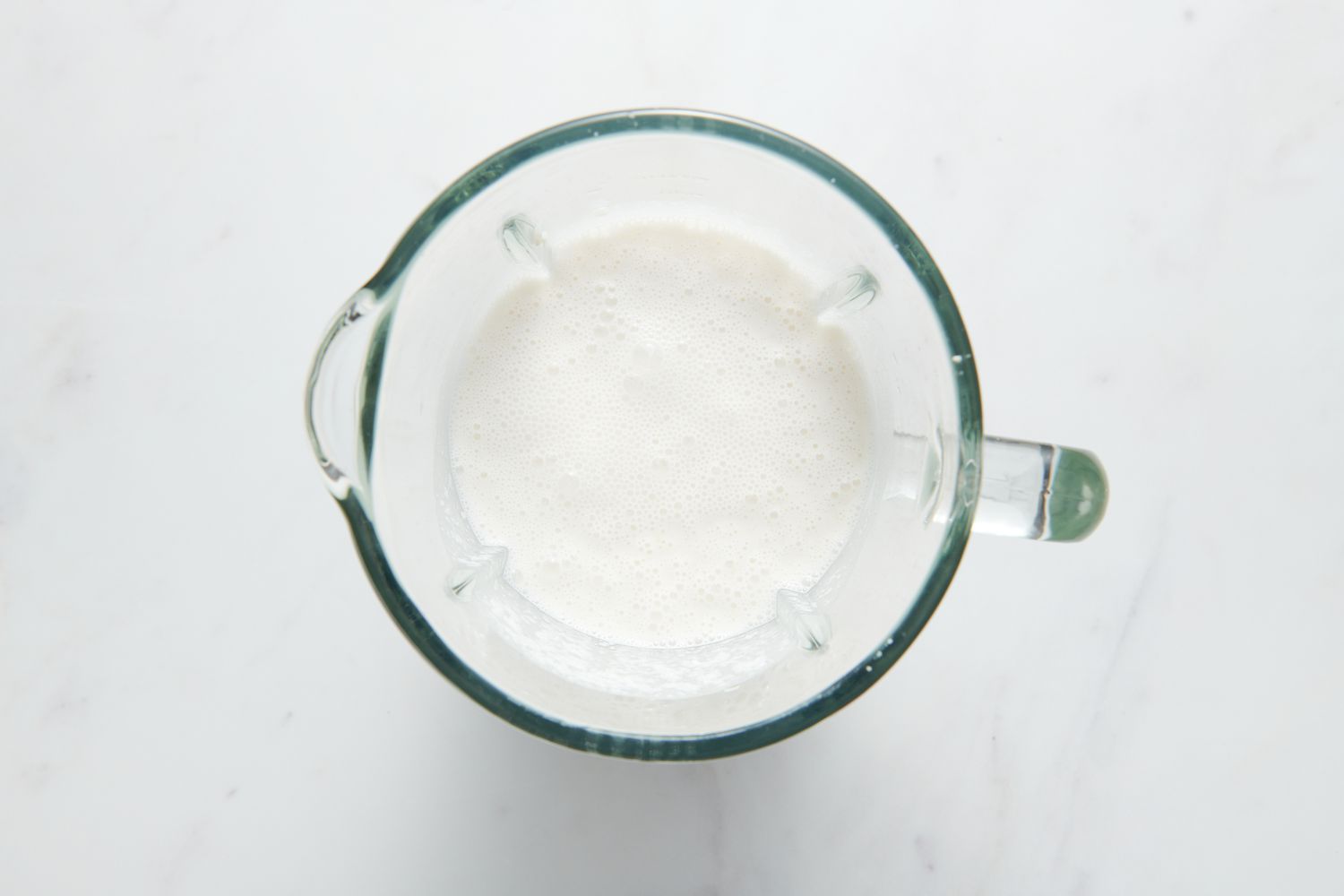 A blender pitcher with pureed Sona Marusi rice
