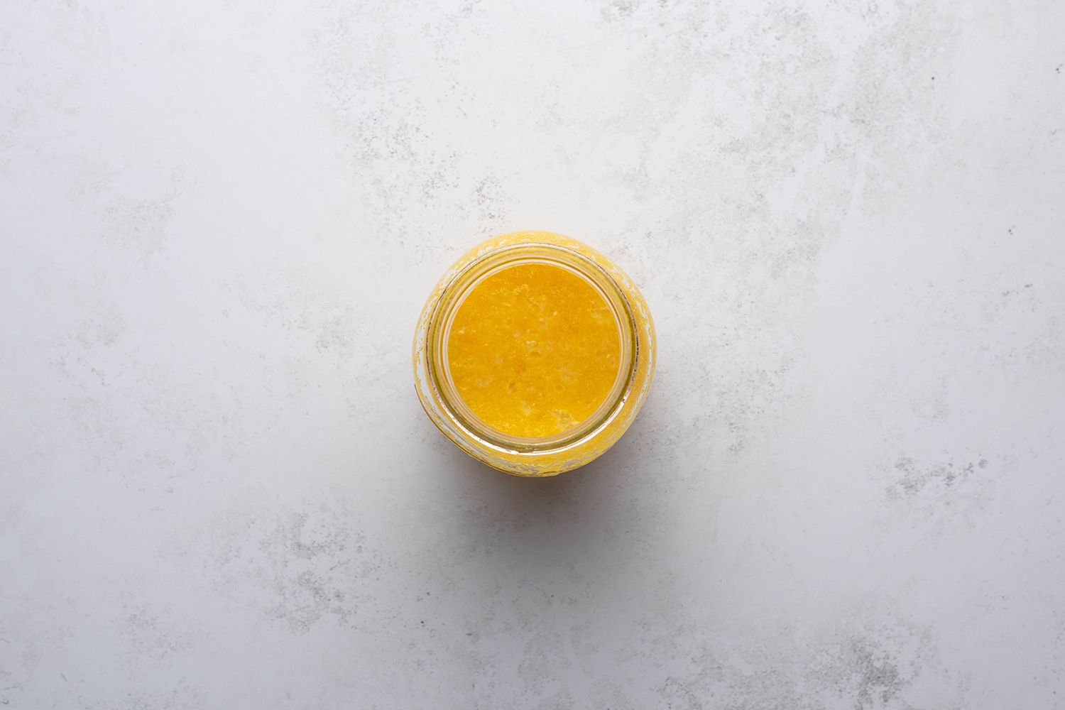 Lemon curd in a glass container