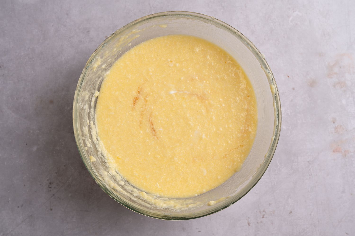 Vanilla, milk, and sour cream added to the batter