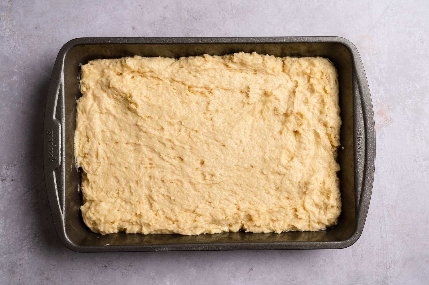 Cake batter in the prepared baking dish