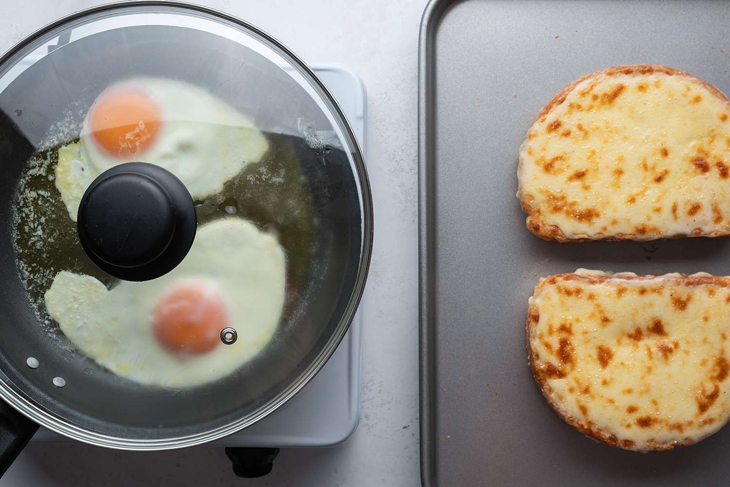 Eggs cooking in a covered pan