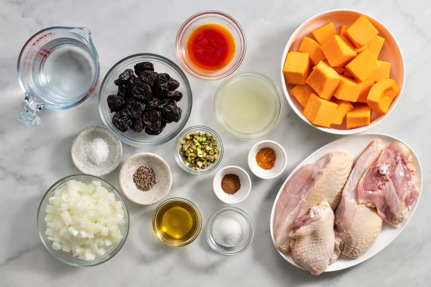 ingredientes para Khoresh Kadu Halvaee, guisado de frango reunido