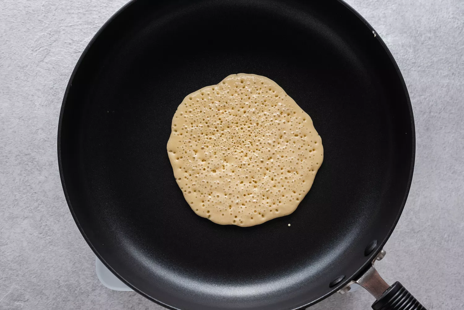 Pancake cooking in a skillet