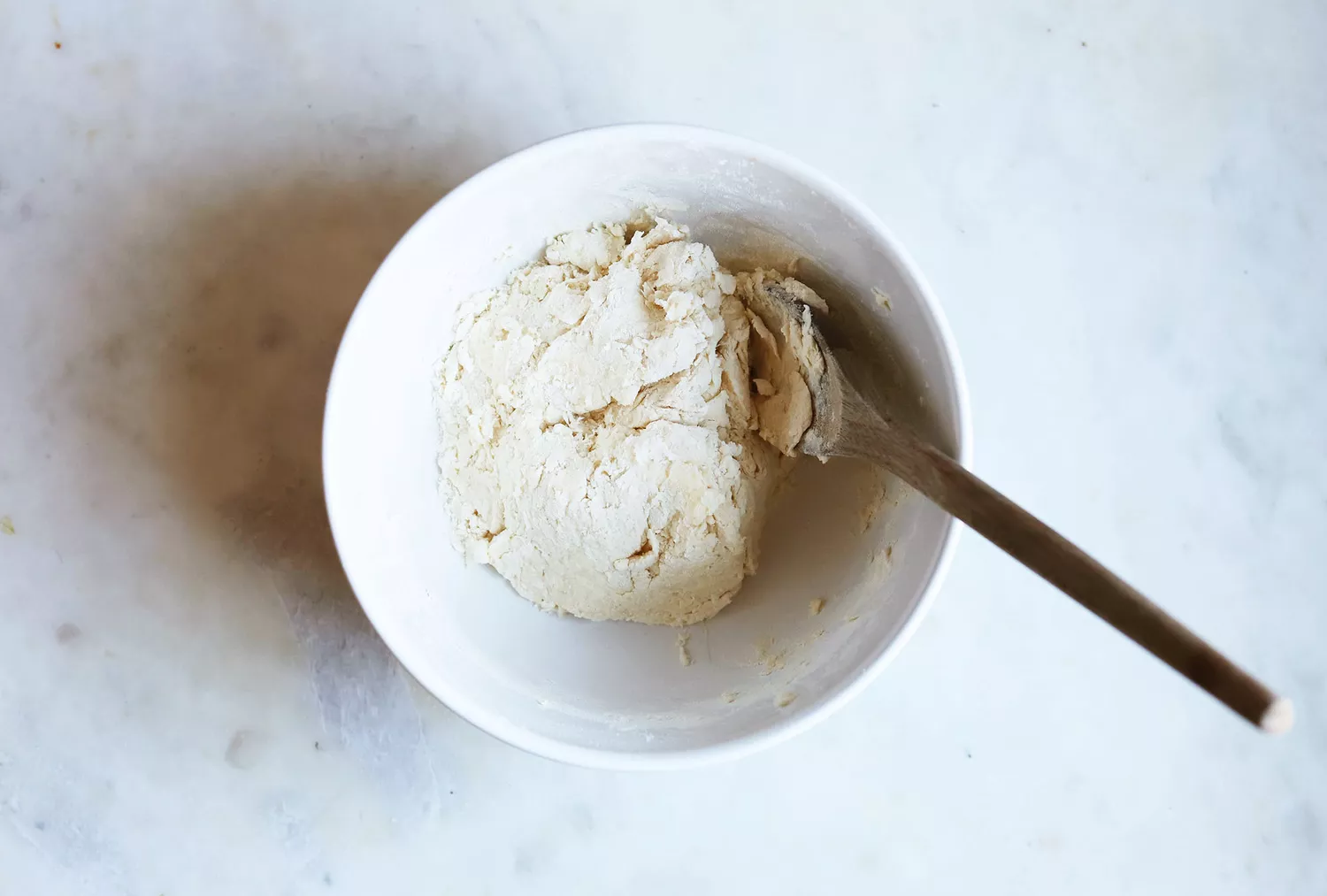 dumpling dough mixed in a bowl